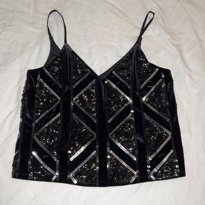 Back sequin top with velvet material in the back
